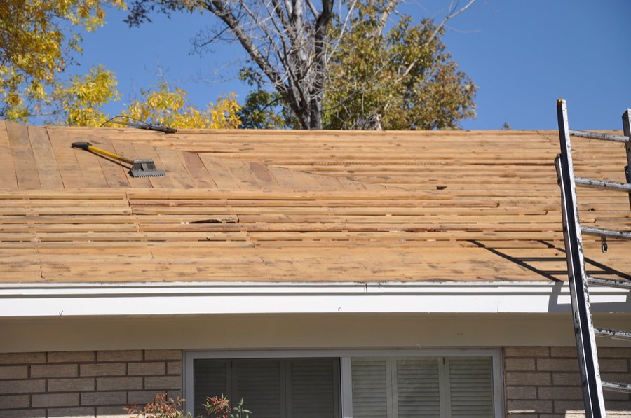 Roof stripped to the deck during an asphalt shingle tear-off